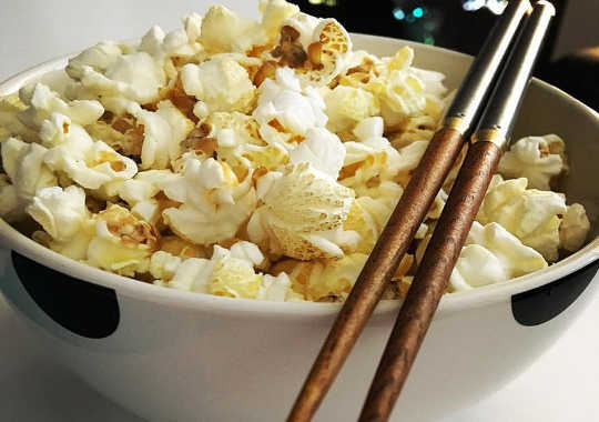 Why You Should Eat Popcorn With Chopsticks – And Other Psychological Tricks To Make Life More Enjoyable
