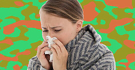 picture of a woman blowing her nose